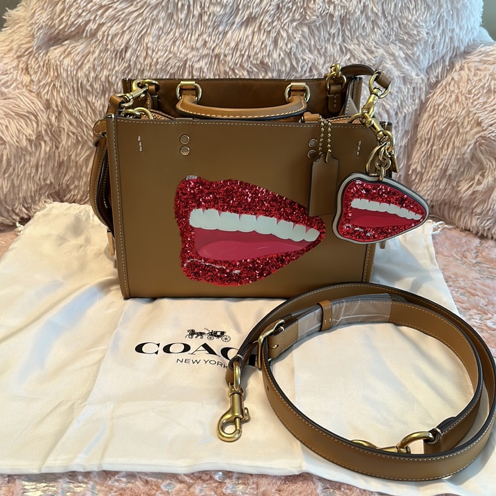 Coach Wesselmann rouge